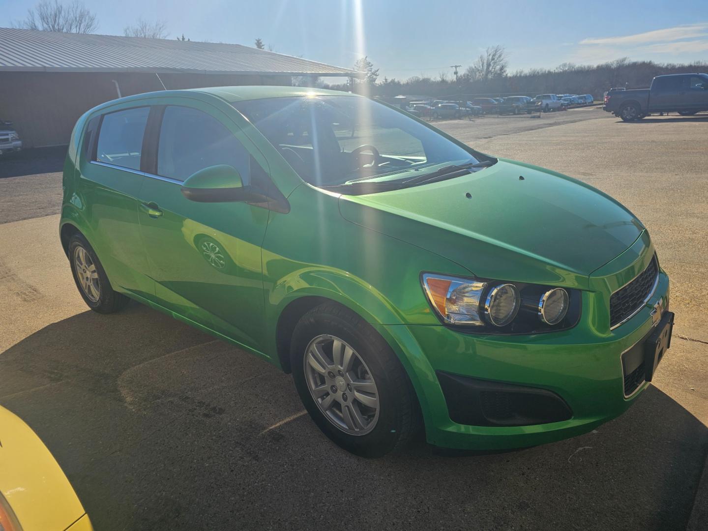 2016 GREEN Chevrolet Sonic LT Auto 5-Door (1G1JC6SH6G4) with an 1.8L L4 DOHC 24V engine, 6A transmission, located at 533 S Seven Points BLVD, Seven Points, TX, 75143, (430) 255-4030, 32.313999, -96.209351 - Photo#1